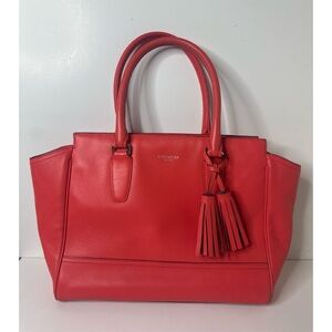 Coach coral genuine Leather tasseled purse